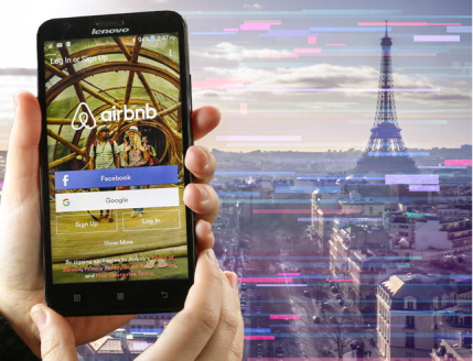 airbnb app open on smartphone while looking over paris with data tree graphics overlaid